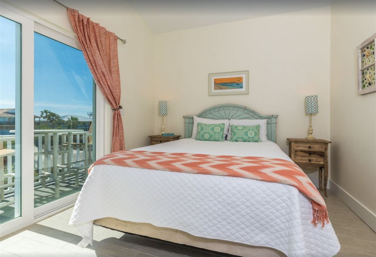 5349 Atlantic View St. Augustine, FL 32080 - Photo 28 of 33 a bedroom with a bed and window