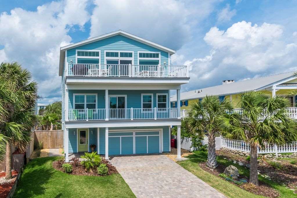 5349 Atlantic View St. Augustine, FL 32080 - Photo 3 of 33 a front view of a house with garden