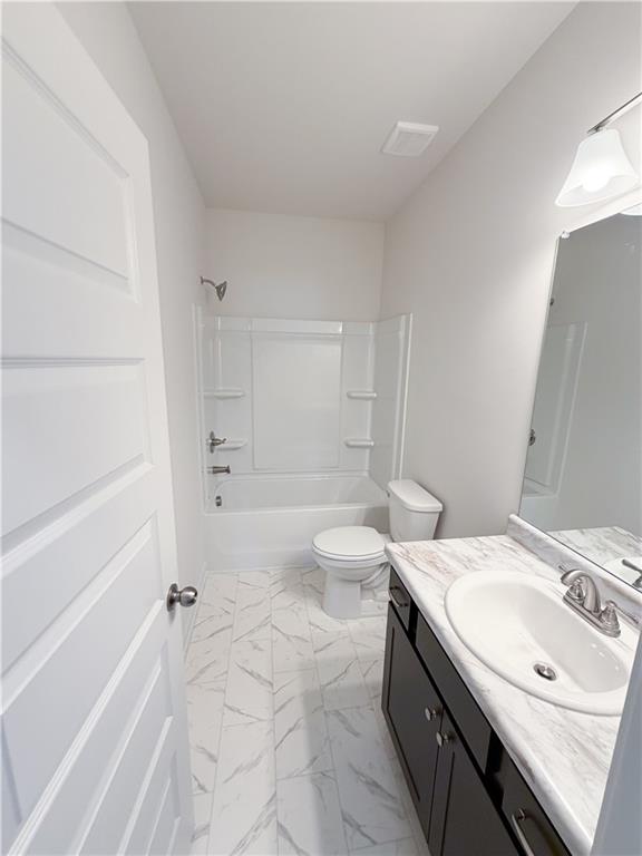 145 Red Oak Lane Calhoun, GA 30701 - Photo 14 of 18 a bathroom with a sink a toilet and shower