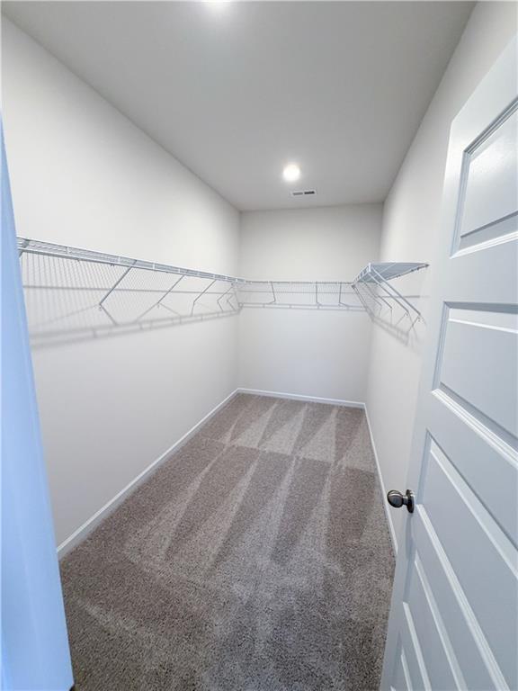 145 Red Oak Lane Calhoun, GA 30701 - Photo 7 of 18 a view of a room with racks on the wall