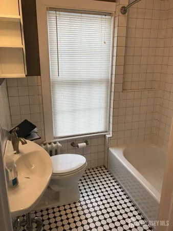 a view of swimming pool from a balcony