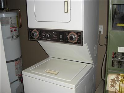 401 El Cielo Road, Unit 227 Palm Springs, CA 92262 - Photo 14 of 24 a utility room with dryer and washer