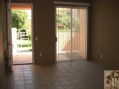 401 El Cielo Road, Unit 227 Palm Springs, CA 92262 - Photo 4 of 24 a view of an empty room with a window