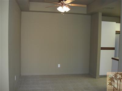 401 El Cielo Road, Unit 227 Palm Springs, CA 92262 - Photo 5 of 24 a view of a livingroom with a chandelier fan