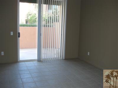401 El Cielo Road, Unit 227 Palm Springs, CA 92262 - Photo 6 of 24 a view of an empty room with a window