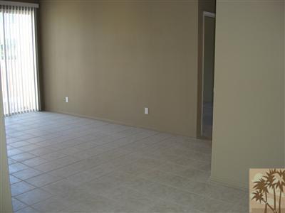 401 El Cielo Road, Unit 227 Palm Springs, CA 92262 - Photo 7 of 24 a view of an empty room with a window