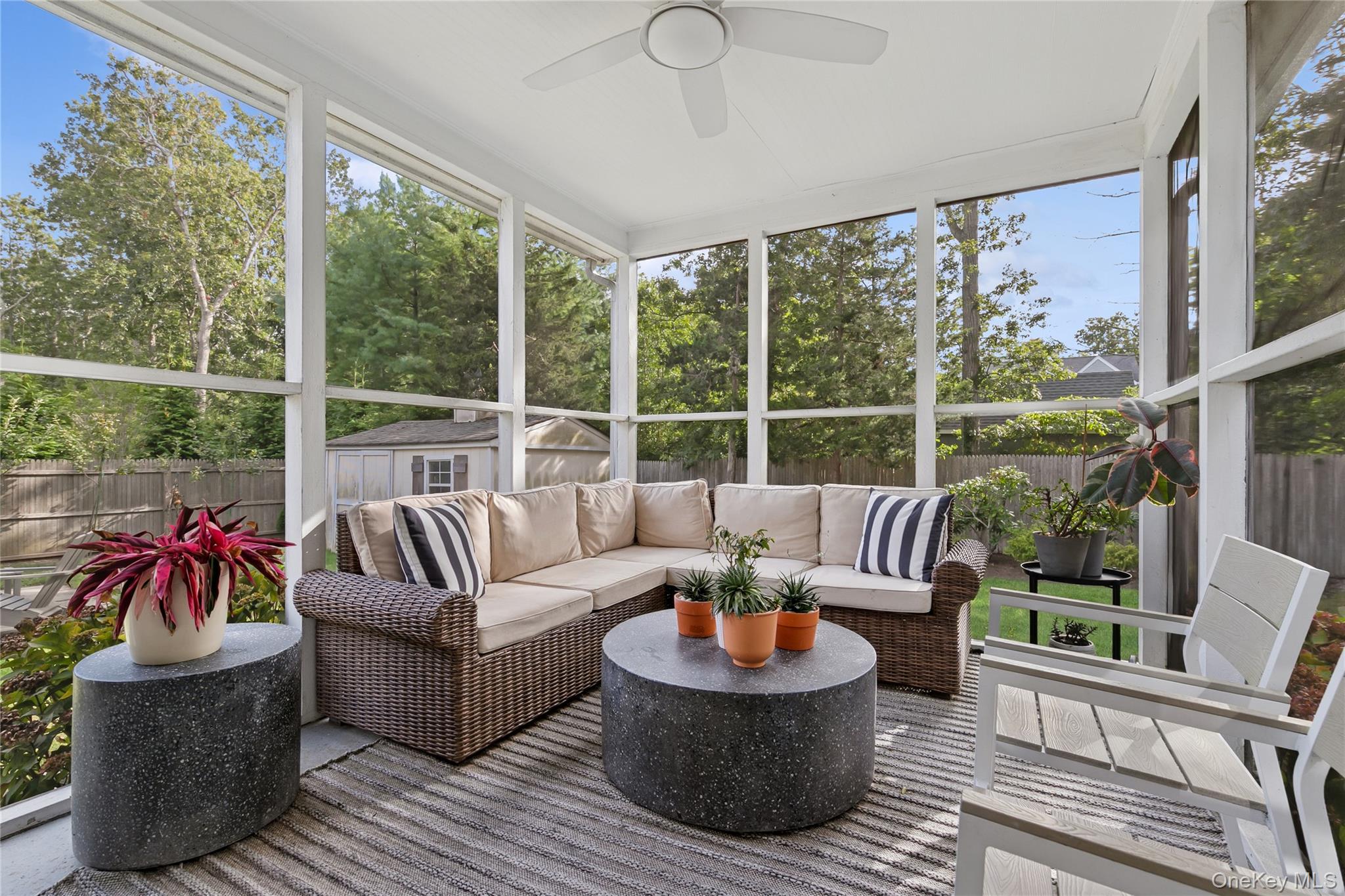 1181 Fireplace Road East Hampton, NY 11937 - Photo 11 of 26 a living room with furniture and a large window