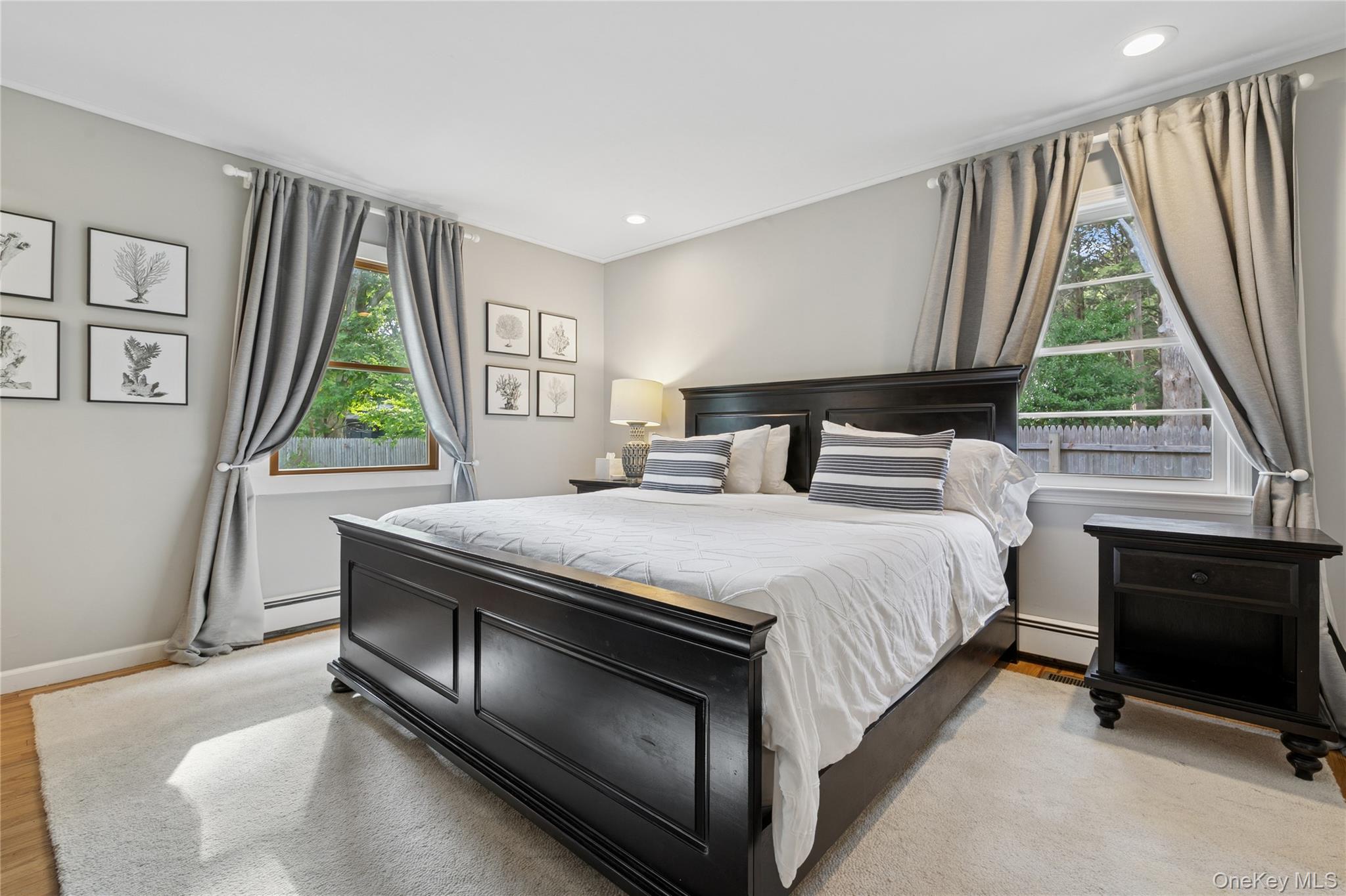 1181 Fireplace Road East Hampton, NY 11937 - Photo 15 of 26 a bedroom with a bed and a window