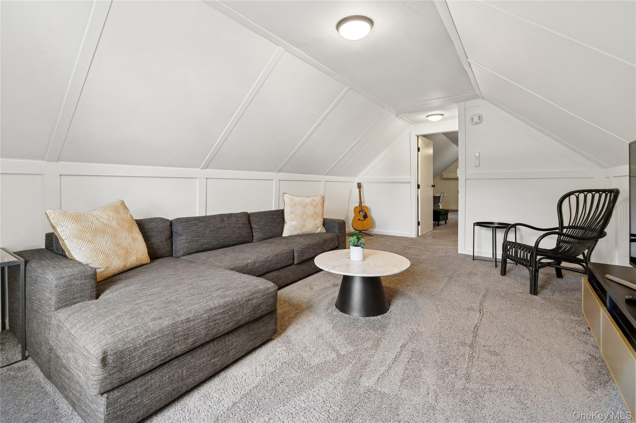 1181 Fireplace Road East Hampton, NY 11937 - Photo 22 of 26 a living room with furniture and a wooden floor