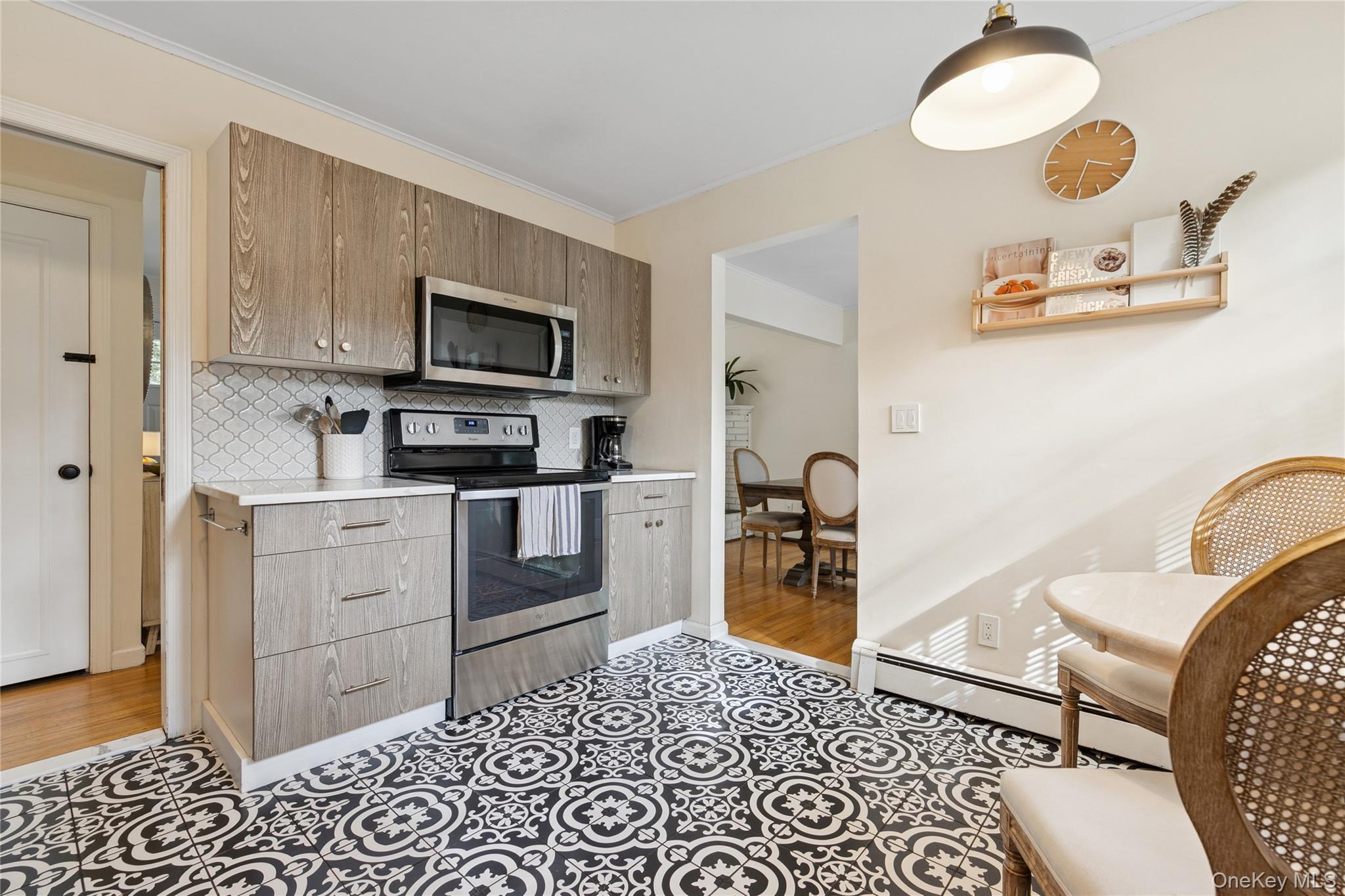 1181 Fireplace Road East Hampton, NY 11937 - Photo 9 of 26 a kitchen with stainless steel appliances kitchen island granite countertop a stove and a sink