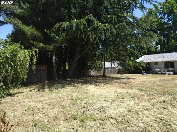 a house with trees in front of it