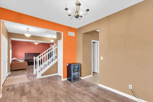 a view of livingroom with stairs