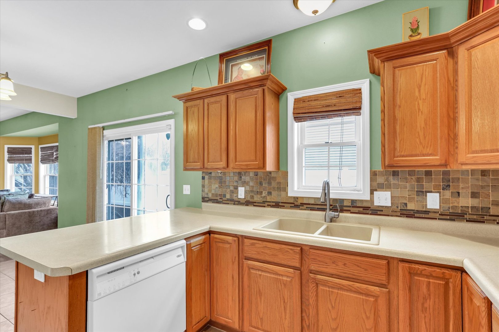 1328 West Ridge Lane Champaign, IL 61822 - Photo 21 of 41 a kitchen with a sink and a window