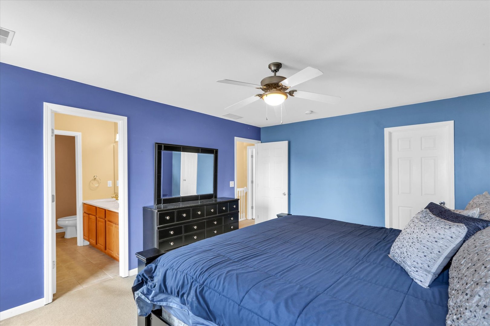 1328 West Ridge Lane Champaign, IL 61822 - Photo 28 of 41 a bedroom with a bed and a dresser