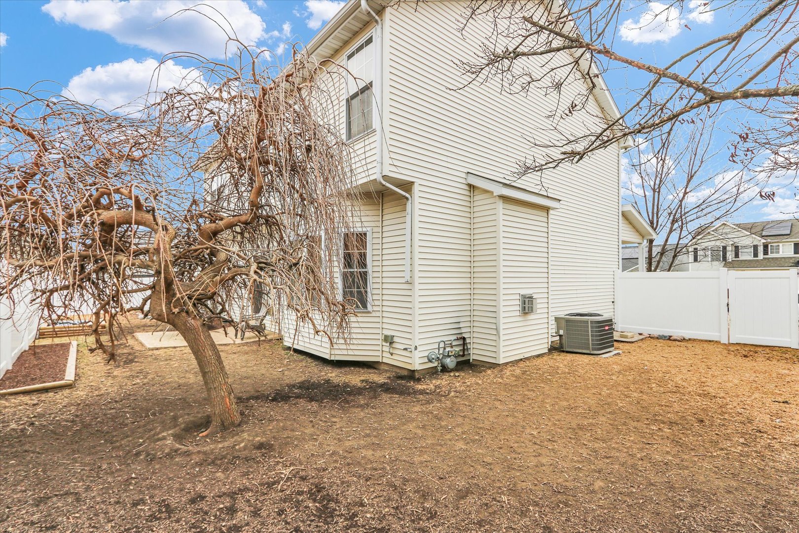 1328 West Ridge Lane Champaign, IL 61822 - Photo 40 of 41 a view of a house with a yard