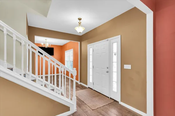 a view of a hallway with entryway
