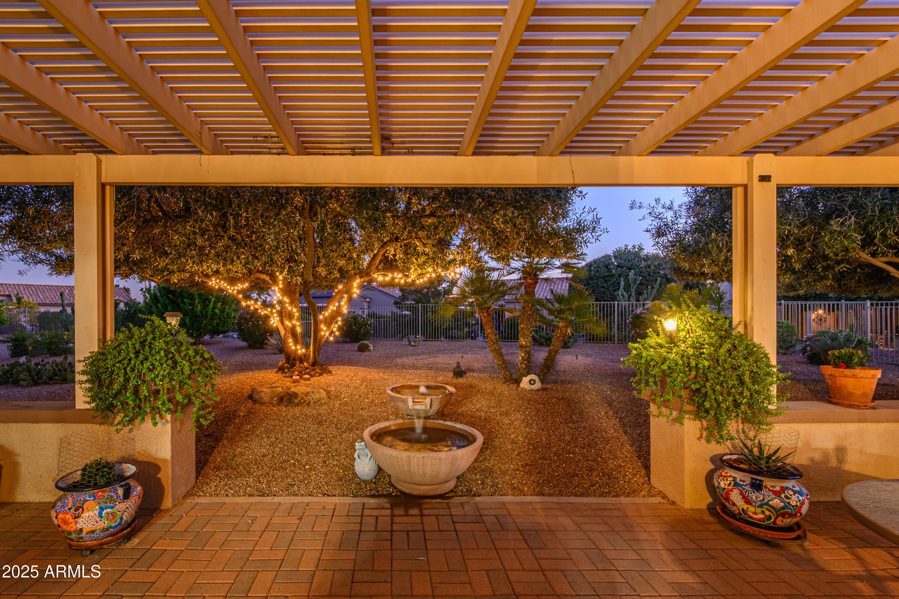 15883 West Cisa Rio Lane Surprise, AZ 85374 - Photo 11 of 45 a room with lots of potted plants