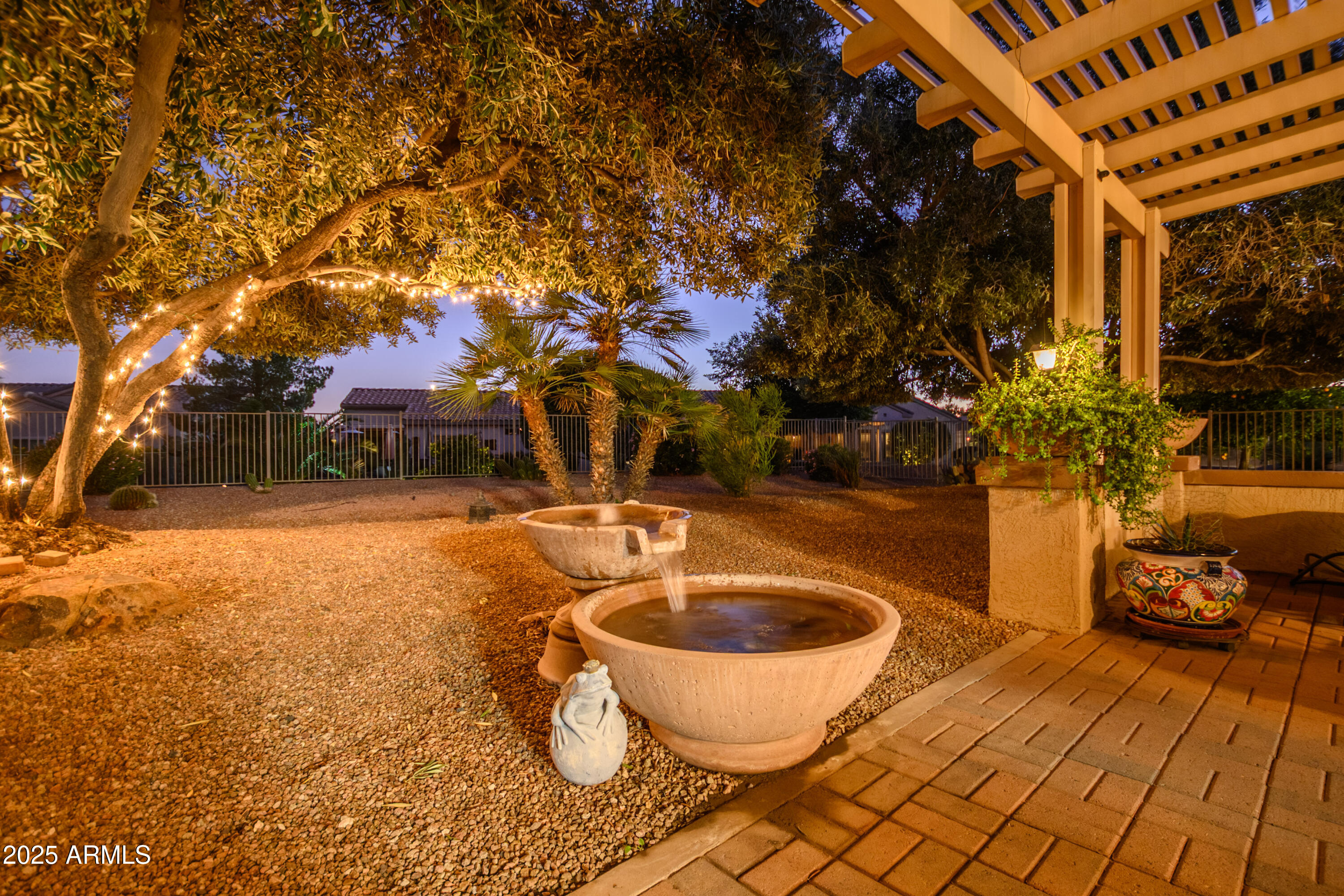 15883 West Cisa Rio Lane Surprise, AZ 85374 - Photo 16 of 45 a view of outdoor space yard and swimming pool