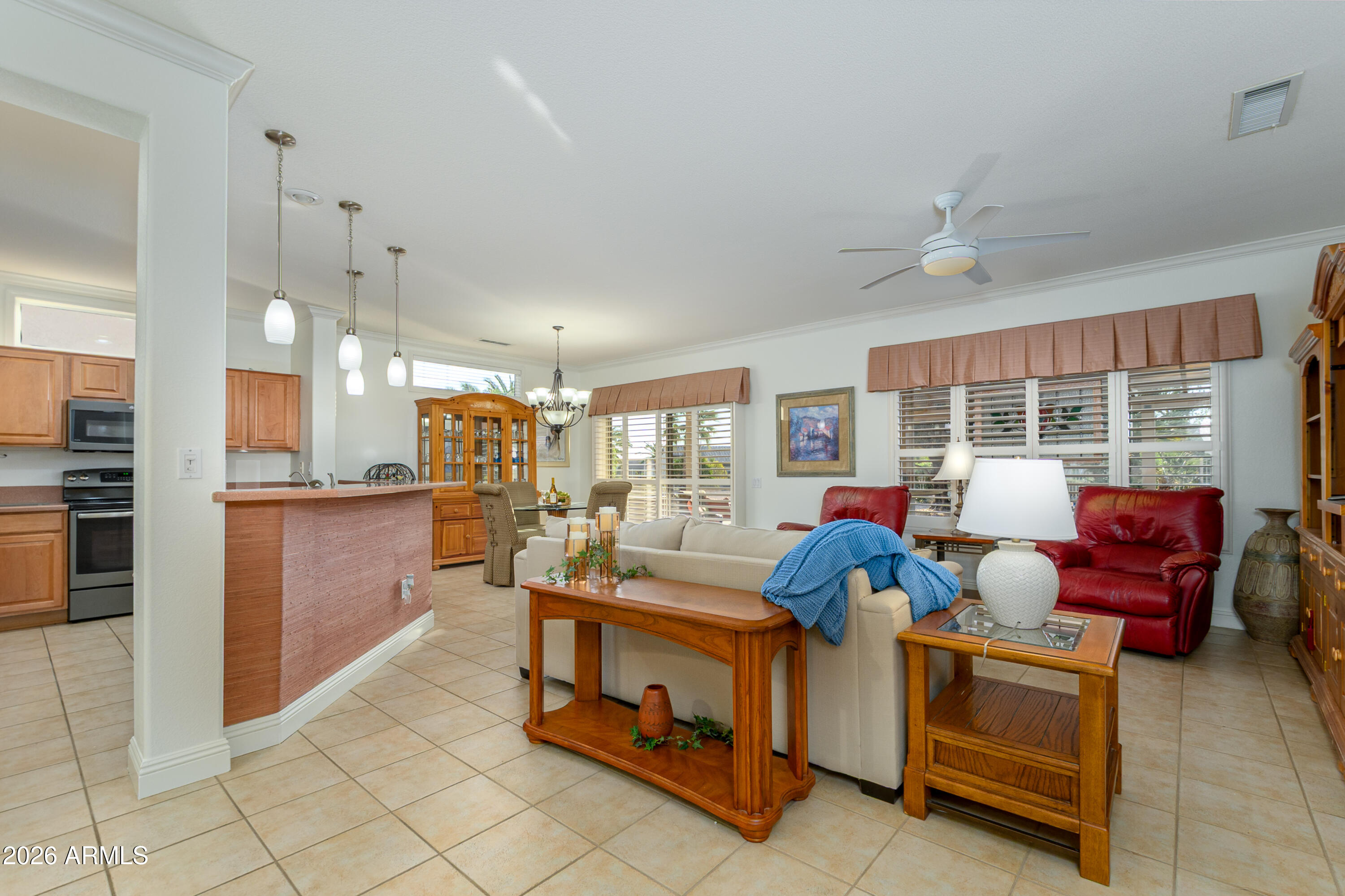 15883 West Cisa Rio Lane Surprise, AZ 85374 - Photo 45 of 45 a living room with furniture and a table