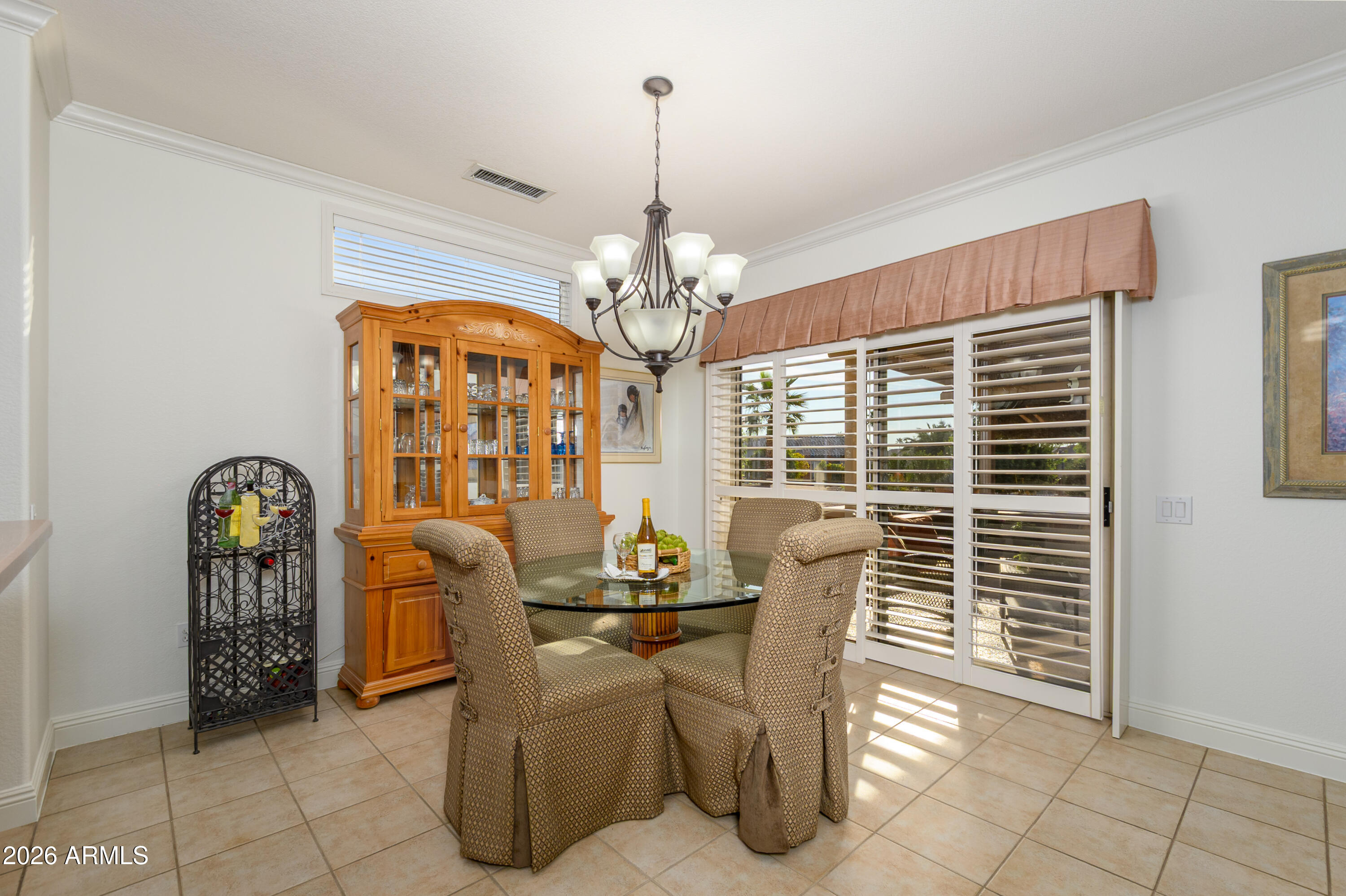 15883 West Cisa Rio Lane Surprise, AZ 85374 - Photo 23 of 45 a dining room with furniture and window