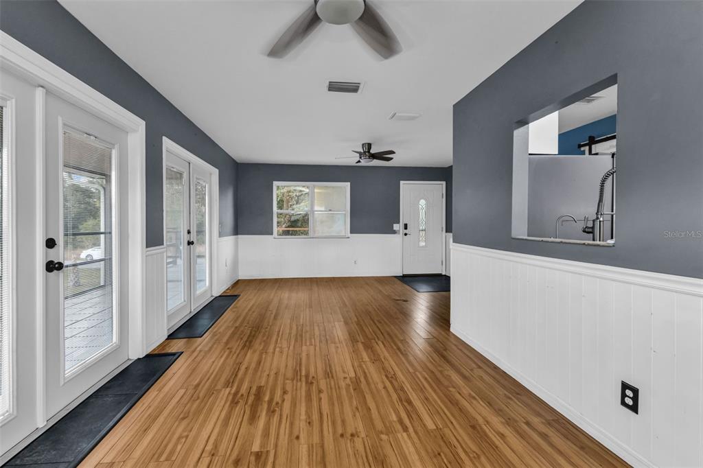 29341 Passion Flower Street Punta Gorda, FL 33982 - Photo 14 of 68 a view of room with window and wooden floor