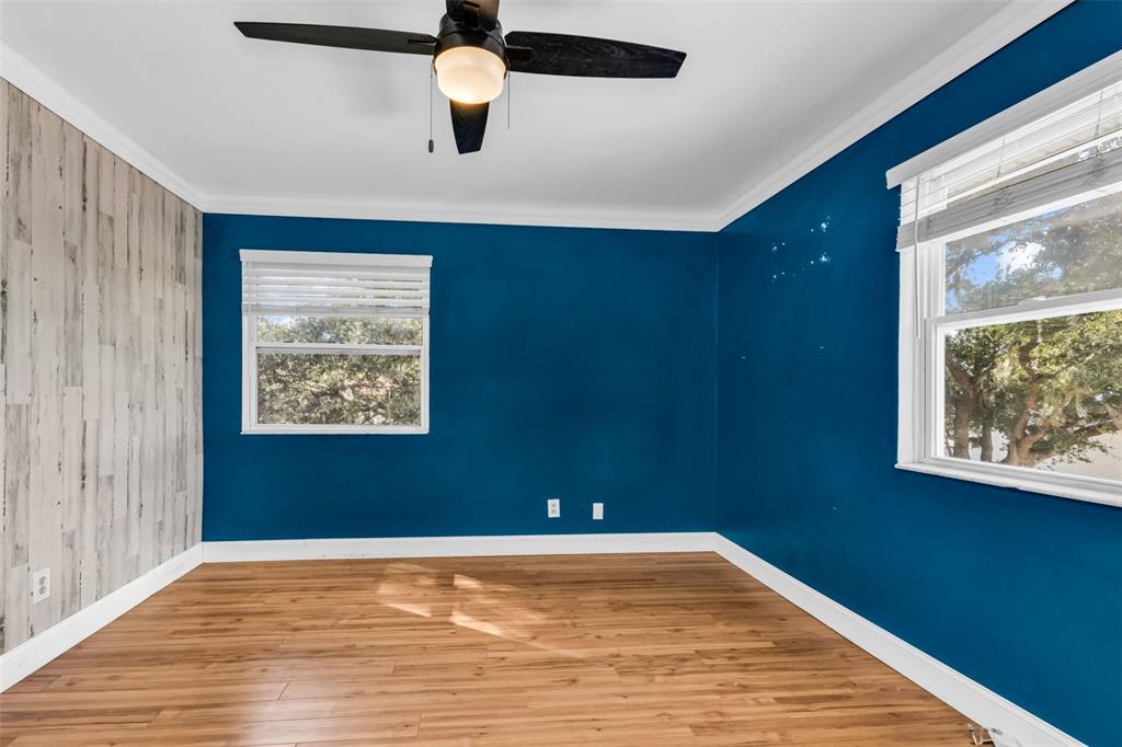 29341 Passion Flower Street Punta Gorda, FL 33982 - Photo 32 of 68 a view of a room with a window and wooden floor
