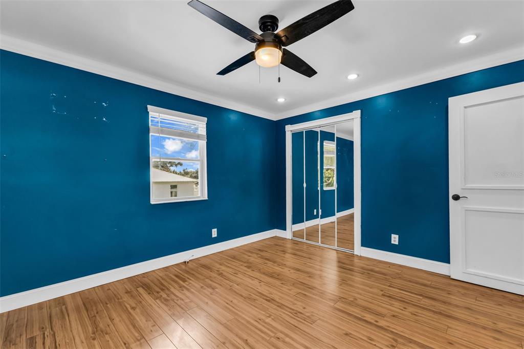 29341 Passion Flower Street Punta Gorda, FL 33982 - Photo 33 of 68 a view of empty room with wooden floor