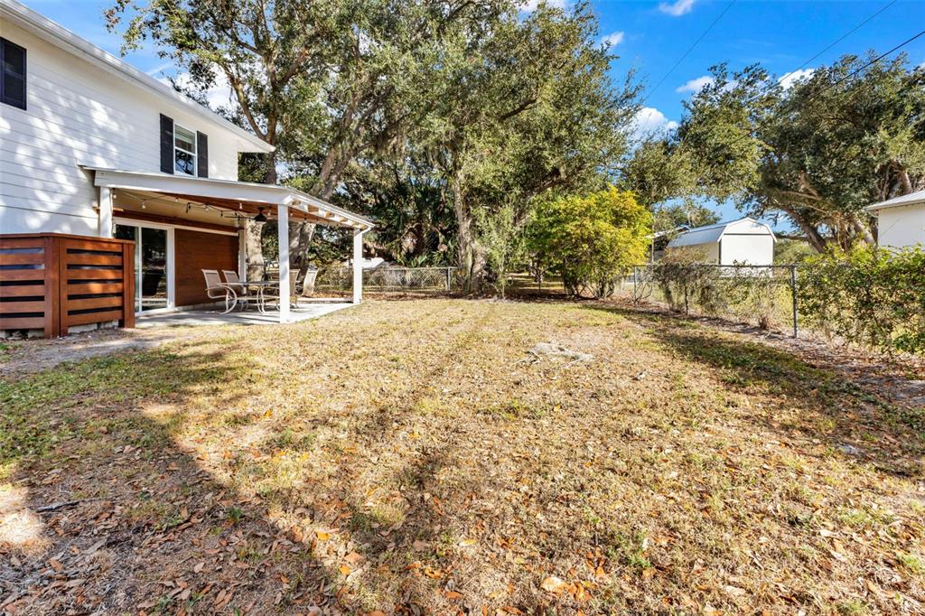 29341 Passion Flower Street Punta Gorda, FL 33982 - Photo 43 of 68 a front view of a house with a yard