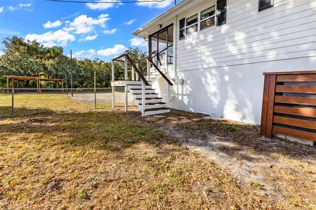 a view of a terrace with a trees
