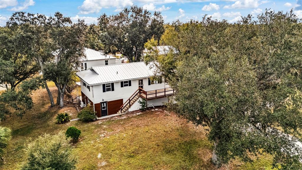29341 Passion Flower Street Punta Gorda, FL 33982 - Photo 56 of 68 a view of a house with a yard