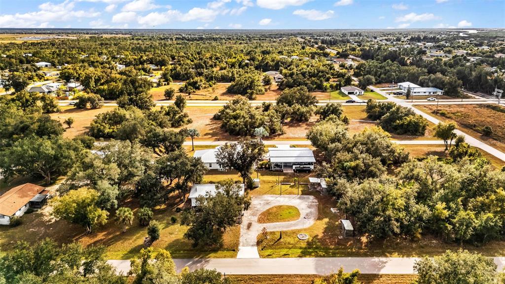 29341 Passion Flower Street Punta Gorda, FL 33982 - Photo 59 of 68 an aerial view of a residential houses with city view