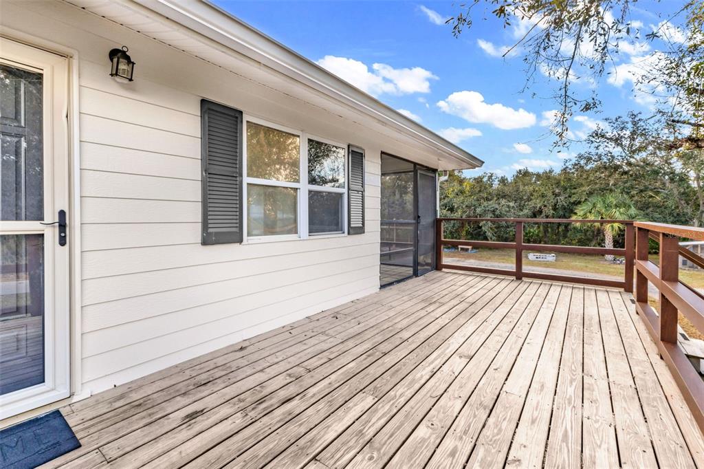 29341 Passion Flower Street Punta Gorda, FL 33982 - Photo 7 of 68 a view of outdoor space with wooden floor