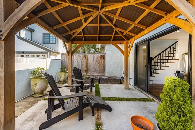 a patio with table and chairs