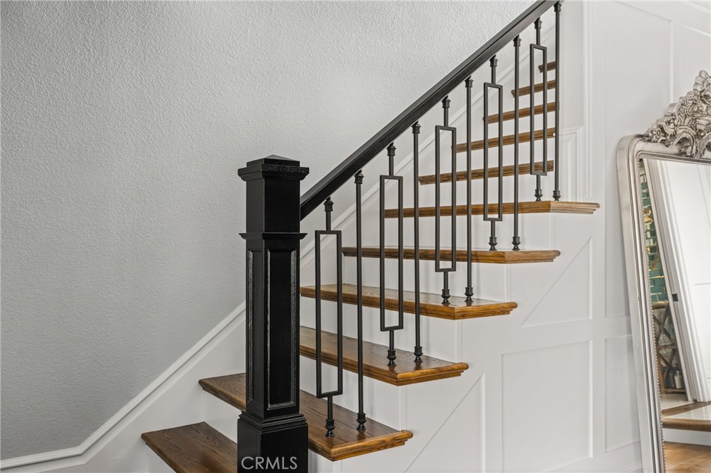 1055 Tustin Pines Way Tustin, CA 92780 - Photo 19 of 31 a view of entryway with wooden floor