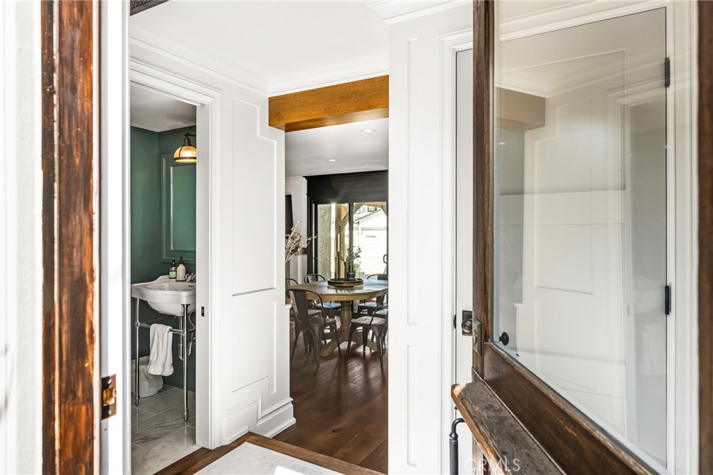 1055 Tustin Pines Way Tustin, CA 92780 - Photo 5 of 31 a view of a hallway and a livingroom with furniture