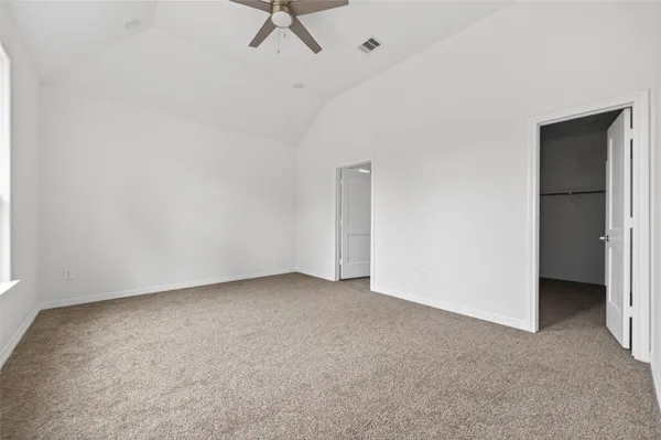 a view of an empty walk in closet