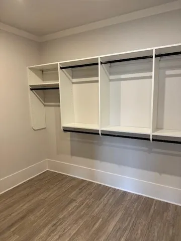 a bathroom with a sink vanity and mirror