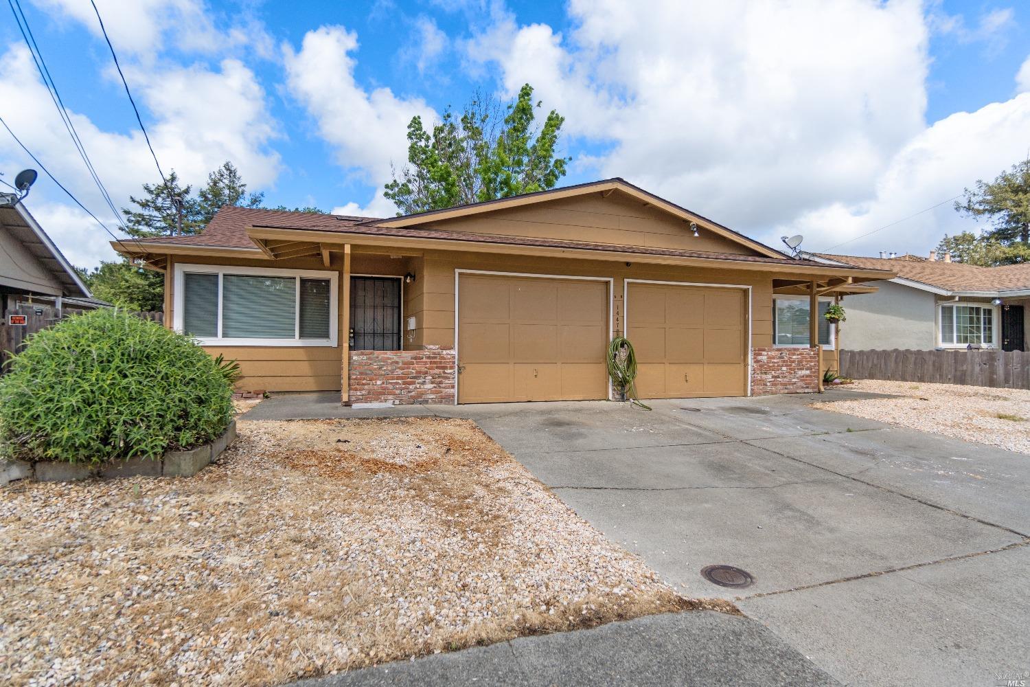 front view of house with a yard