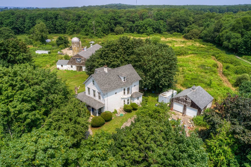 228 E Road Tiverton, RI 02878 - Photo 1 of 27 an aerial view of a house with yard swimming pool and outdoor seating
