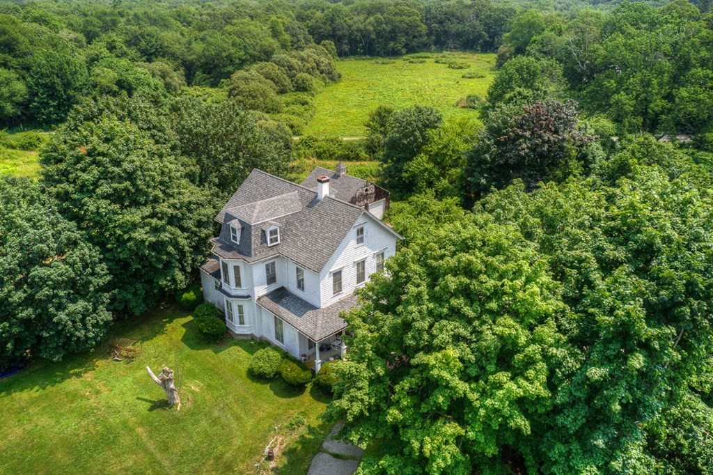228 E Road Tiverton, RI 02878 - Photo 15 of 27 an aerial view of residential houses with outdoor space and trees