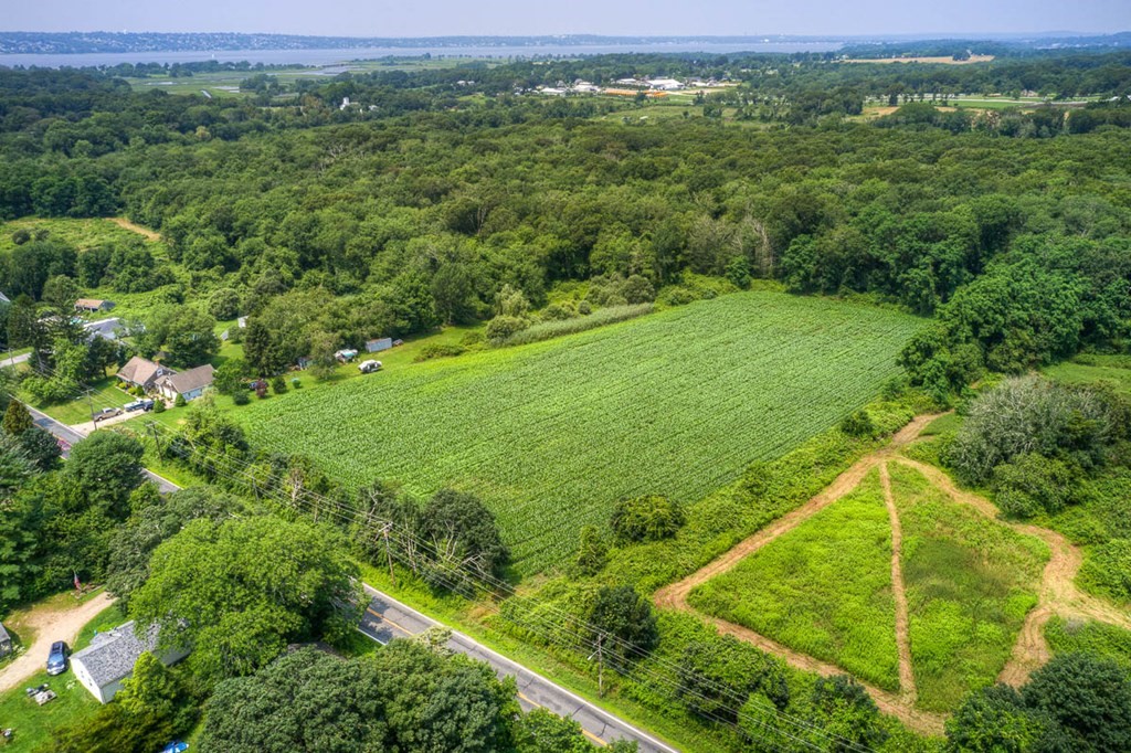 228 E Road Tiverton, RI 02878 - Photo 7 of 27 a view of a lush green space