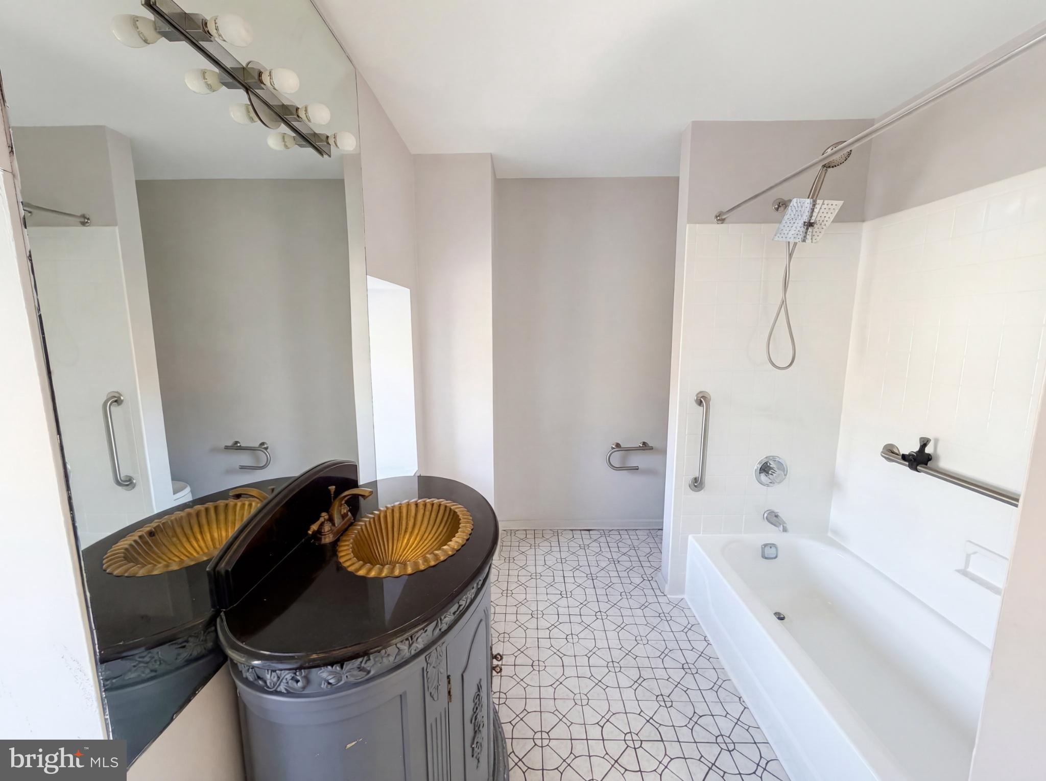 724 13th Street Northeast Washington, DC 20002 - Photo 11 of 20 Sleek bathroom with modern elegance.
