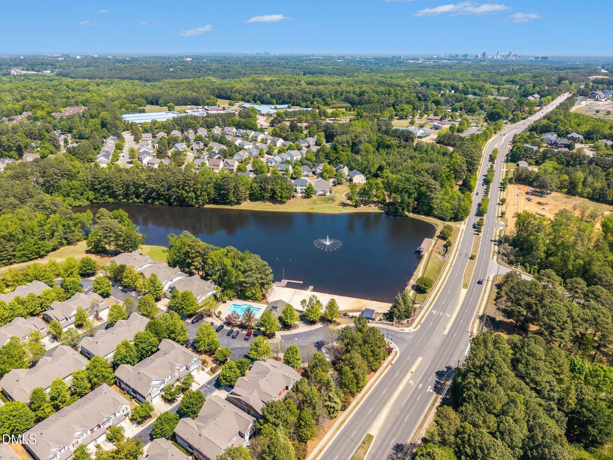 2409 Memory Ridge Drive Raleigh, NC 27606 - Photo 36 of 36 an aerial view of lake and residential houses with outdoor space