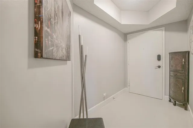 an aerial view of a residential houses with swimming pool and outdoor space