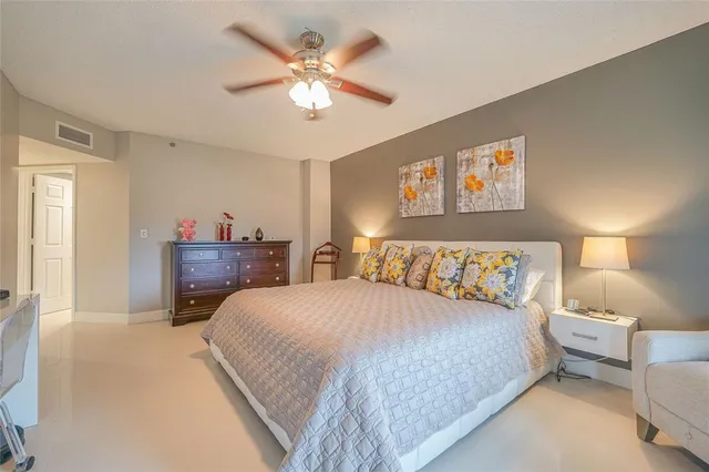 a view of swimming pool with outdoor seating