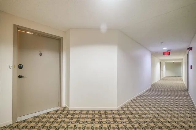 a view of a livingroom with a potted plant
