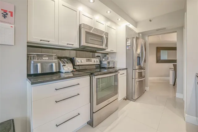 a living room with furniture and window