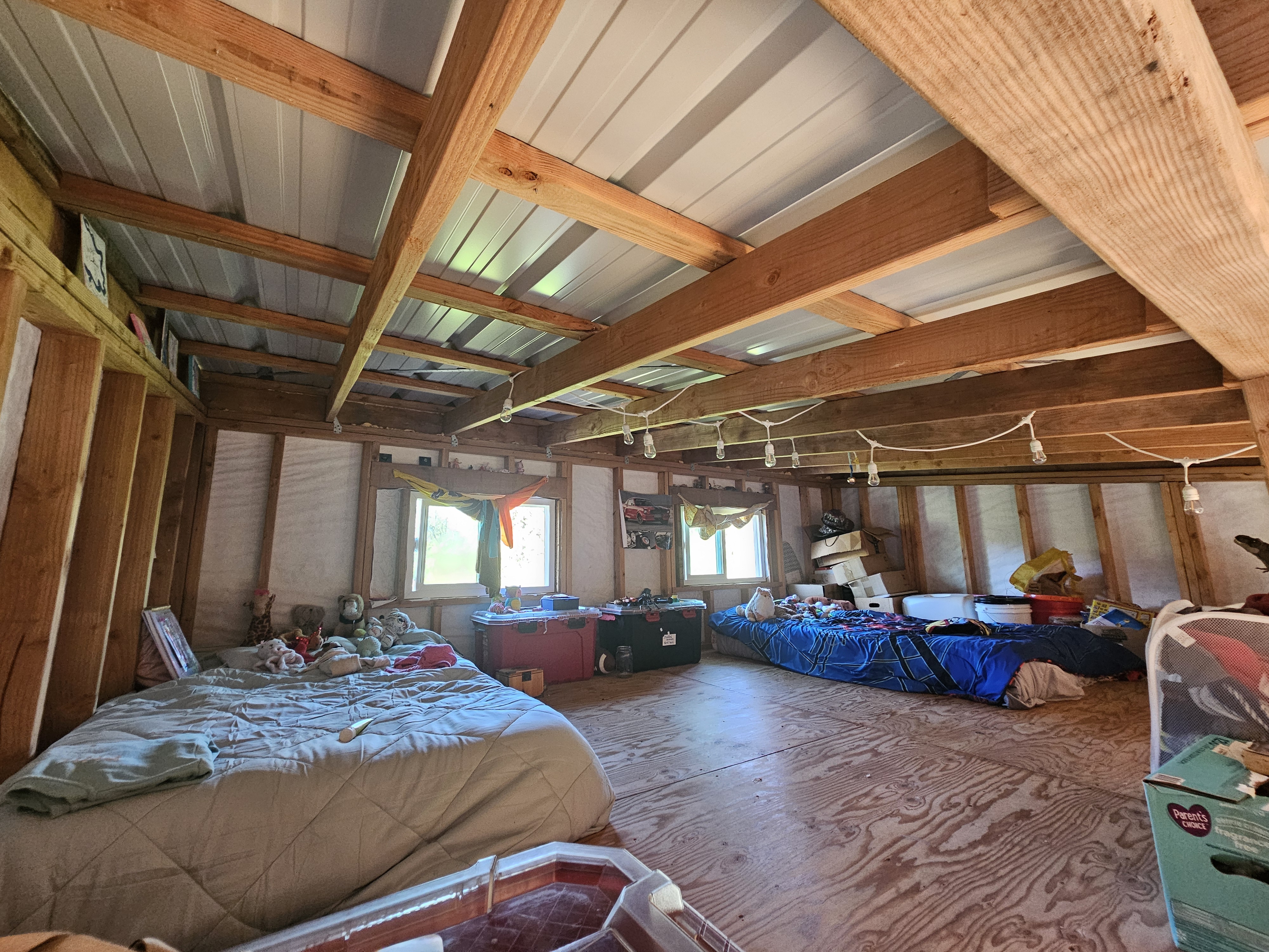 11-2093 Alii Wao Road Pahoa, HI 96778 - Photo 10 of 21 a bed room with furniture and a window