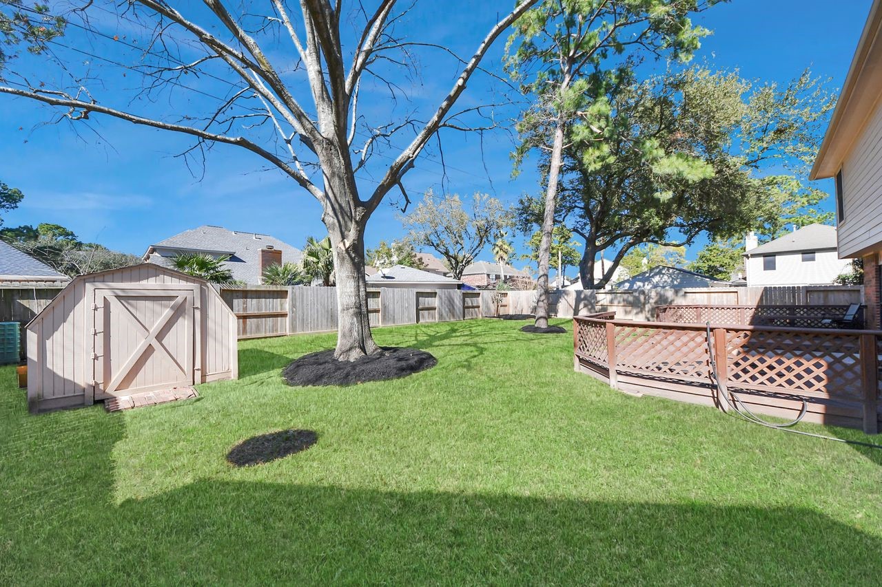 7607 Plum Tree Forest Circle Houston, TX 77095 - Photo 39 of 42 a view of a couches in backyard of house