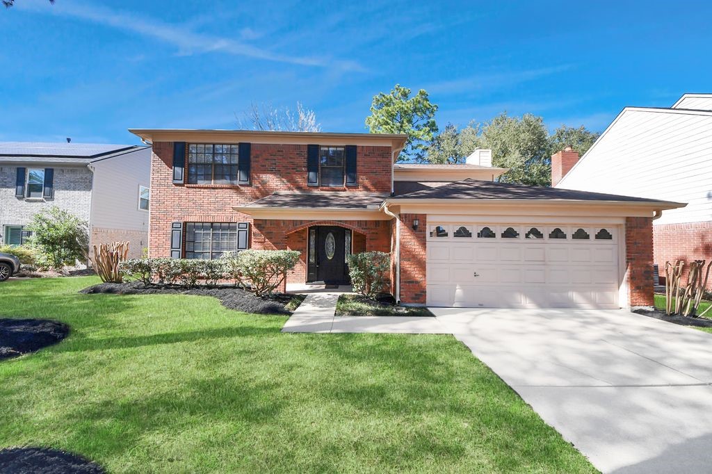7607 Plum Tree Forest Circle Houston, TX 77095 - Photo 4 of 42 a view of a house with a yard and sitting area